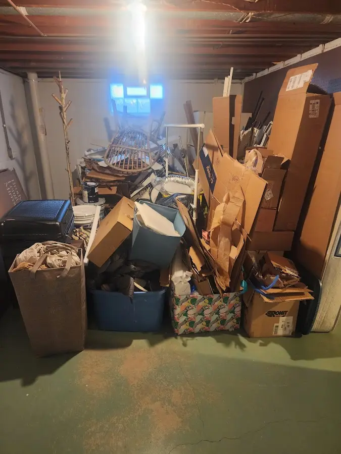 Roll-off dumpster container at job site for Yard Waste Dumpster Rental in Oakwood